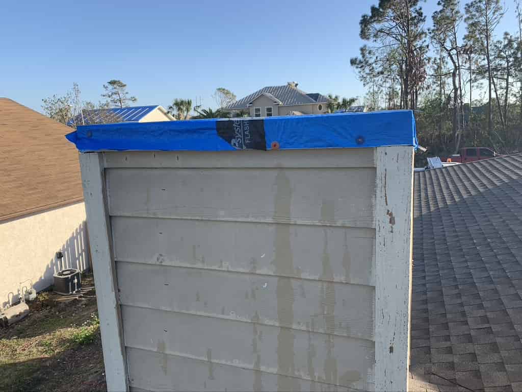 chimney sweep repairing storm damage in Gulf Shores